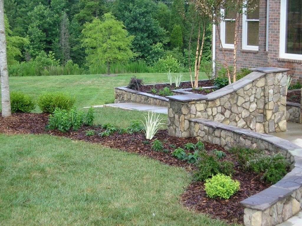 Retaining walls and planters build by Top garden landscaping