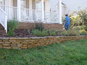 Retaining wall and garden bed build by Top garden landscaping