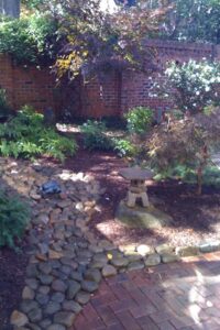 Brick patio, French drain, plantation and landscaping by Top Garden, Charlotte
