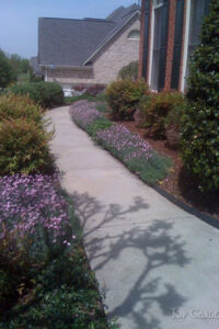 Hardscaping Projects in Charlotte, NC, featuring installation of concrete pad walkway
