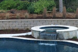 Retaining wall, Plantation and much beds build by Top Gardens