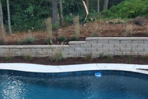 Retaining wall build by Top Gardens Landscaping.