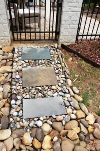 Garden pathway installation services by Top Gardens Landscaping.