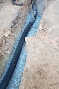 Lawn trenching, catch basin installation, yard drainage solutions, and top garden landscaping in Charlotte, NC.