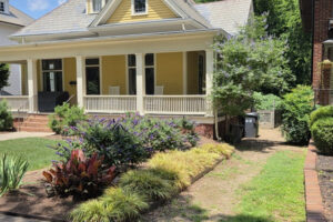 Residential lawn care, perennial flower bed design, and top garden landscaping services for a front yard in Charlotte, NC.