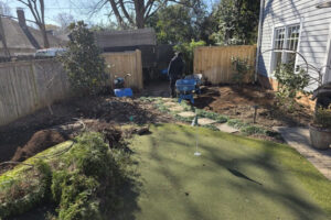 Fresh soil bed prepared by top garden landscaping at a Charlotte, NC residential property.