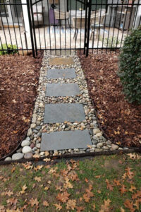 Garden pathway build by Top Garden at Charlotte Residence